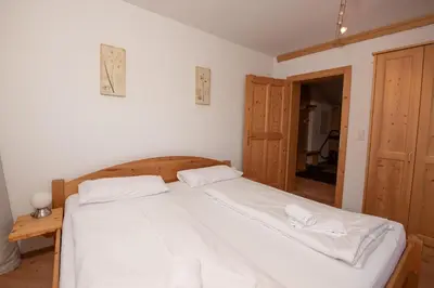 Ein Bett oder Betten in einem Zimmer der Unterkunft Haus 129 Top 2