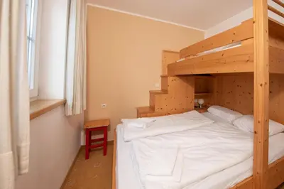Ein Bett oder Betten in einem Zimmer der Unterkunft Haus 129 Top 2