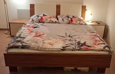 Ein Bett oder Betten in einem Zimmer der Unterkunft Ferienwohnung mit Bergkulisse