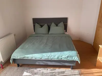 Ein Bett oder Betten in einem Zimmer der Unterkunft Ferienwohnung im Herzen Tirols