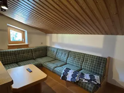 Ein Sitzbereich in der Unterkunft Ferienapartment Tauernblick
