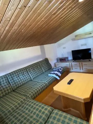 Ein Sitzbereich in der Unterkunft Ferienapartment Tauernblick