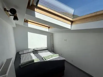 Ein Bett oder Betten in einem Zimmer der Unterkunft Ferienapartment Tauernblick