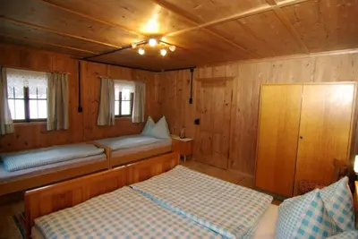 Ein Bett oder Betten in einem Zimmer der Unterkunft Stollenberghütte