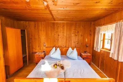 Ein Bett oder Betten in einem Zimmer der Unterkunft Stollenberghütte