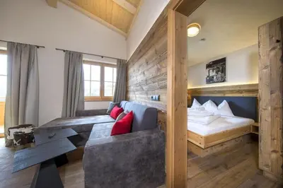 Ein Bett oder Betten in einem Zimmer der Unterkunft Trattenbach Chalet Rettenstein