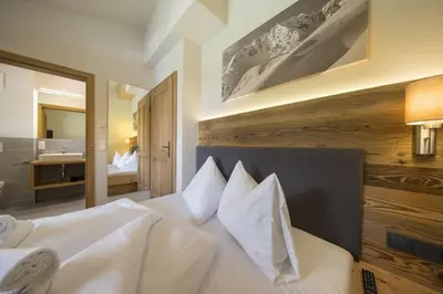 Ein Bett oder Betten in einem Zimmer der Unterkunft Trattenbach Chalet Rettenstein