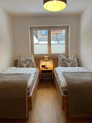Ein Bett oder Betten in einem Zimmer der Unterkunft Haus Steinplatte
