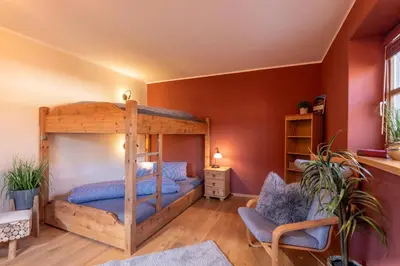 Ein Bett oder Betten in einem Zimmer der Unterkunft 4-Jahreszeiten