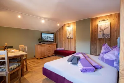 Ein Bett oder Betten in einem Zimmer der Unterkunft 4-Jahreszeiten