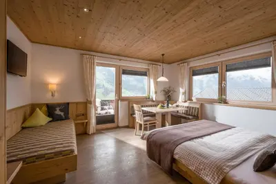 Ein Bett oder Betten in einem Zimmer der Unterkunft Ferienhaus Spitaler