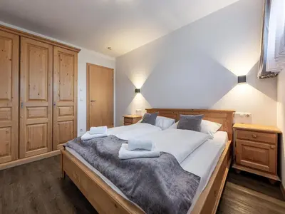 Ein Bett oder Betten in einem Zimmer der Unterkunft Holiday apartment directly on the ski slope