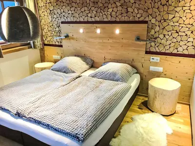 Ein Bett oder Betten in einem Zimmer der Unterkunft Apartment Almchalet Zillertal-1 by Interhome
