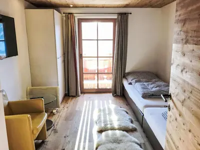 Ein Bett oder Betten in einem Zimmer der Unterkunft Apartment Almchalet Zillertal-2 by Interhome