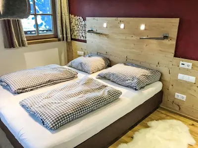 Ein Bett oder Betten in einem Zimmer der Unterkunft Apartment Almchalet Zillertal-2 by Interhome
