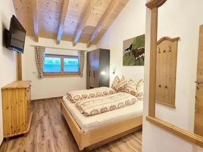 Ein Bett oder Betten in einem Zimmer der Unterkunft Holiday in Mittersill near the Kitzbühel Alps