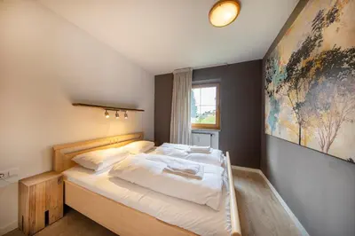 Ein Bett oder Betten in einem Zimmer der Unterkunft Dorfplatz Top 38