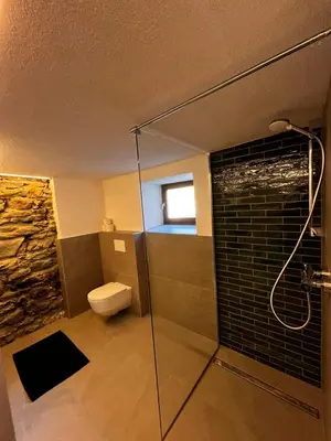 Ein Badezimmer in der Unterkunft Trail & Tiefschnee Lodge
