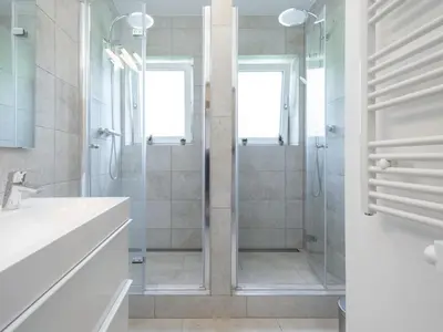 Ein Badezimmer in der Unterkunft Brügglbach XL
