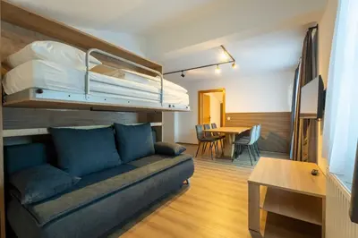 Ein Sitzbereich in der Unterkunft Alpenglück Apartments by we rent, JOKERCARD INCLUDED