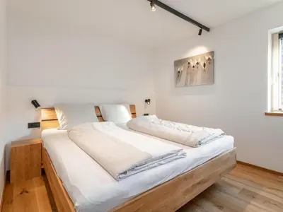 Ein Bett oder Betten in einem Zimmer der Unterkunft Haus Tauernblick Top 2 und 3 und 4