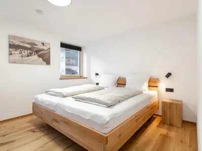 Ein Bett oder Betten in einem Zimmer der Unterkunft Haus Tauernblick Top 2 und 3 und 4