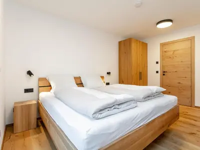 Ein Bett oder Betten in einem Zimmer der Unterkunft Haus Tauernblick Top 3