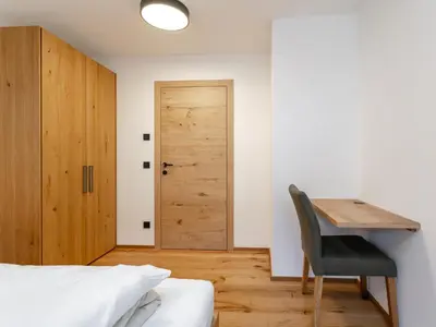Ein Bett oder Betten in einem Zimmer der Unterkunft Haus Tauernblick Top 3