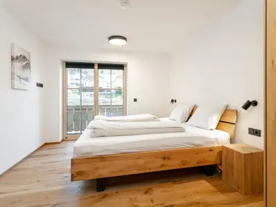 Ein Bett oder Betten in einem Zimmer der Unterkunft Haus Tauernblick Top 3