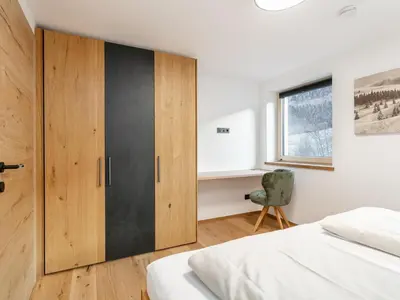 Ein Bett oder Betten in einem Zimmer der Unterkunft Haus Tauernblick Top 2