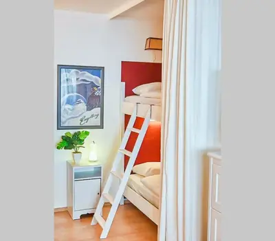 Ein Bett oder Betten in einem Zimmer der Unterkunft Appartement Edelweiss Haus Bellevue Haus D