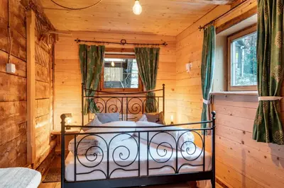Ein Bett oder Betten in einem Zimmer der Unterkunft Kaiserhaus Holiday Apartments