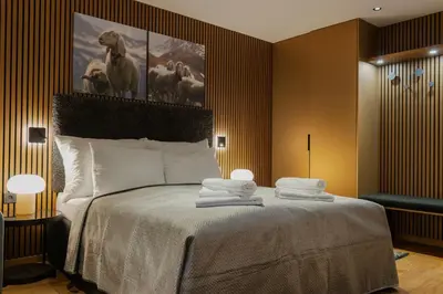 Ein Bett oder Betten in einem Zimmer der Unterkunft KitzSki Luxury Apartment ski-in ski-out accommodation