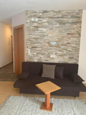 Ein Sitzbereich in der Unterkunft Leo's Appartements