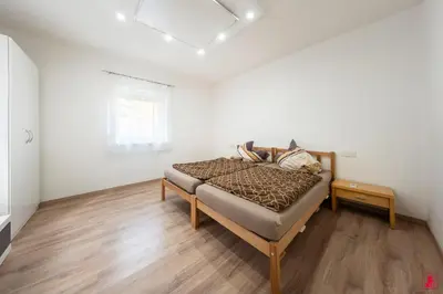 Ein Bett oder Betten in einem Zimmer der Unterkunft Ferienwohnung Los Amigos