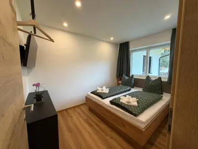 Ein Bett oder Betten in einem Zimmer der Unterkunft Haus Schernthaner