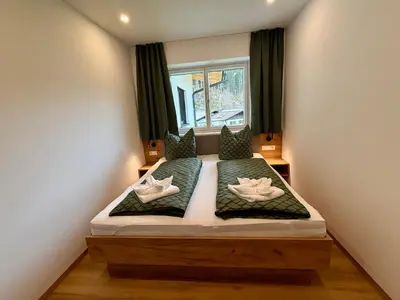 Ein Bett oder Betten in einem Zimmer der Unterkunft Haus Schernthaner