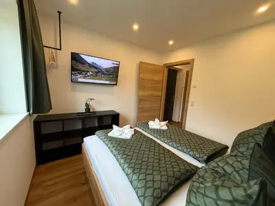 Ein Bett oder Betten in einem Zimmer der Unterkunft Haus Schernthaner