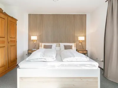 Ein Bett oder Betten in einem Zimmer der Unterkunft Brixen Alpin Living Top 8
