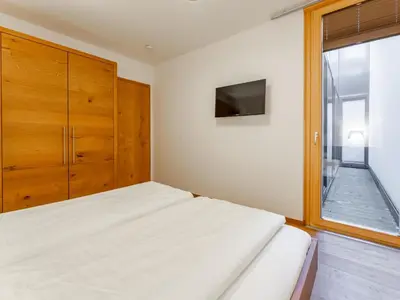 Ein Bett oder Betten in einem Zimmer der Unterkunft Residenz Wildkogelbahn Top 4