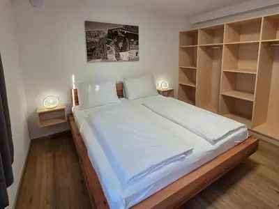 Ein Bett oder Betten in einem Zimmer der Unterkunft Peaceful apartment in the Brixental