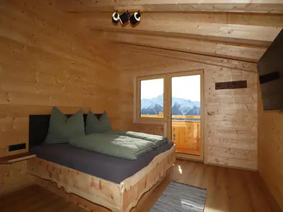 Ein Bett oder Betten in einem Zimmer der Unterkunft Chalet at 1700m with panoramic views