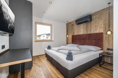 Ein Bett oder Betten in einem Zimmer der Unterkunft Ahorn Studios