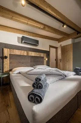 Ein Bett oder Betten in einem Zimmer der Unterkunft Ahorn Studios