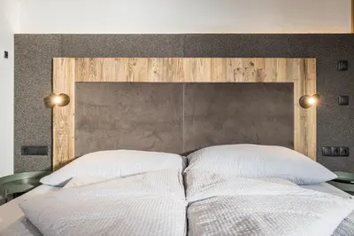 Ein Bett oder Betten in einem Zimmer der Unterkunft Ahorn Studios