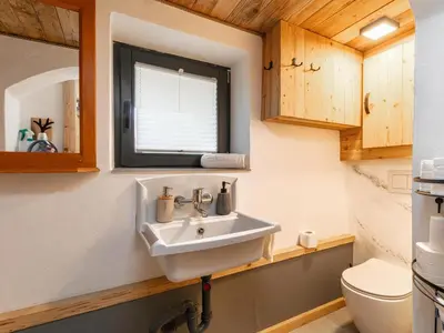Ein Badezimmer in der Unterkunft Almversteck Hollersbach