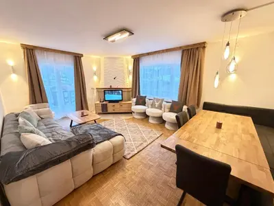 Ein Sitzbereich in der Unterkunft Gruber Alpin Living