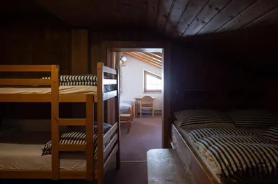 Ein Bett oder Betten in einem Zimmer der Unterkunft Hecherhaus