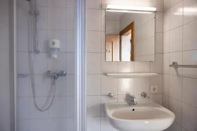 Ein Badezimmer in der Unterkunft Hecherhaus