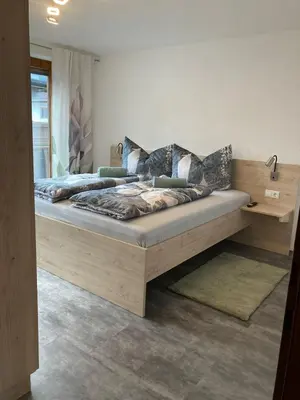 Ein Bett oder Betten in einem Zimmer der Unterkunft Ferienhaus Ehstand